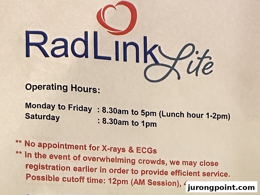 A sign displaying RadLink Lite's operating hours and important service information.