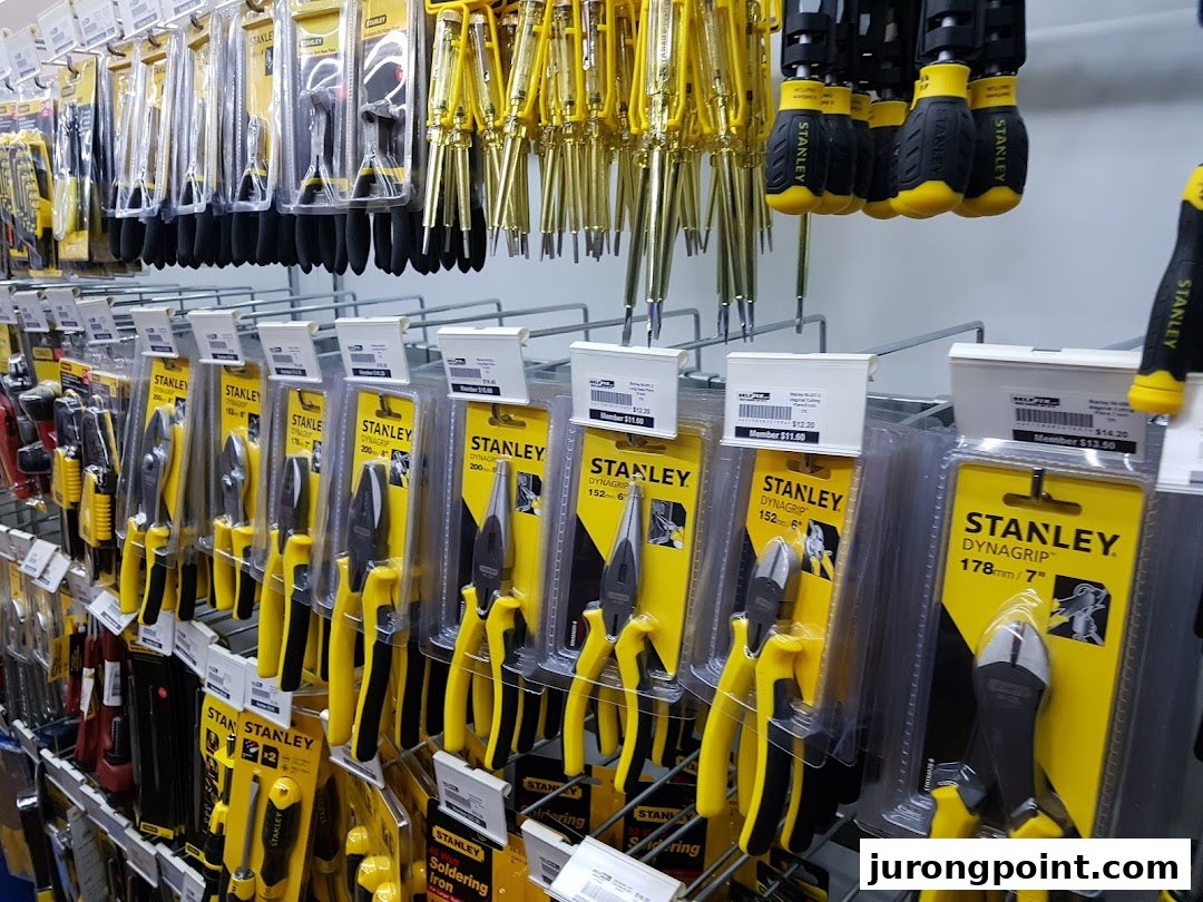 Shelves filled with various Stanley tools like pliers, screwdrivers, and soldering irons at Selffix DIY.