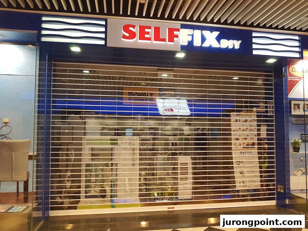 The closed storefront of Selffix DIY, a home improvement and hardware store, featuring its prominent red and white signage.