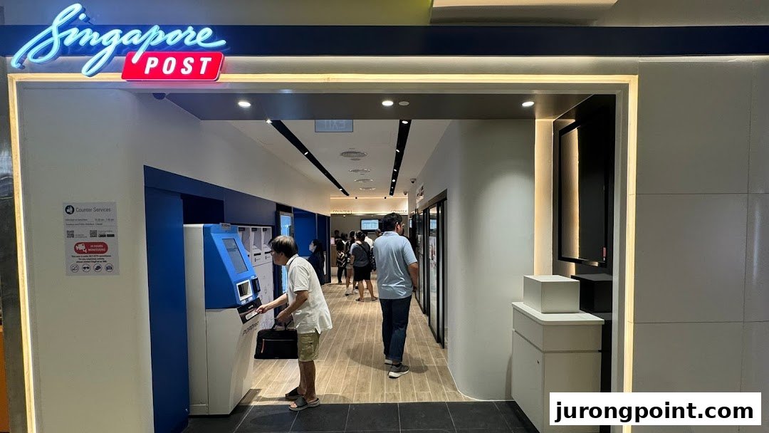 The entrance of Singapore Post at Jurong Point, featuring self-service machines and customers inside.