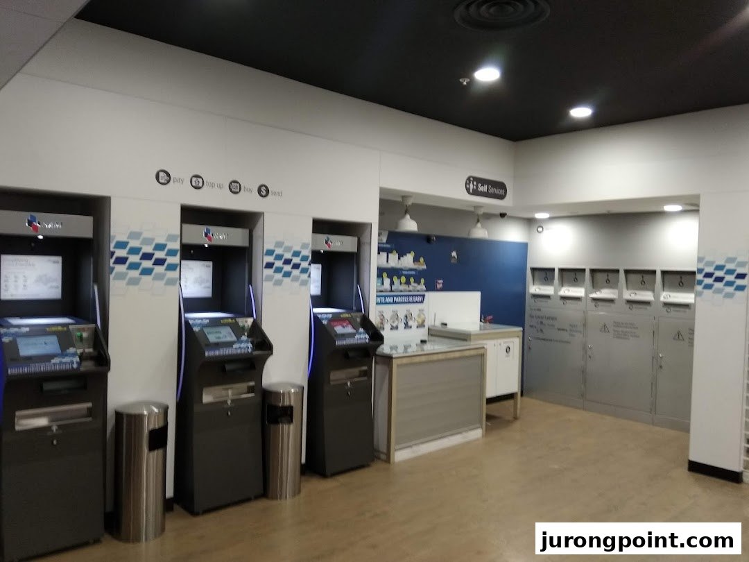 Interior of Singapore Post's self-service area featuring kiosks and parcel lockers.