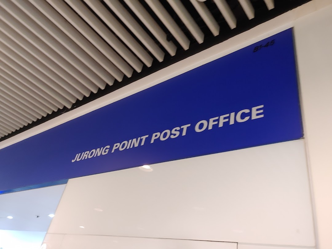 A blue sign for Jurong Point Post Office, indicating its location within the mall.