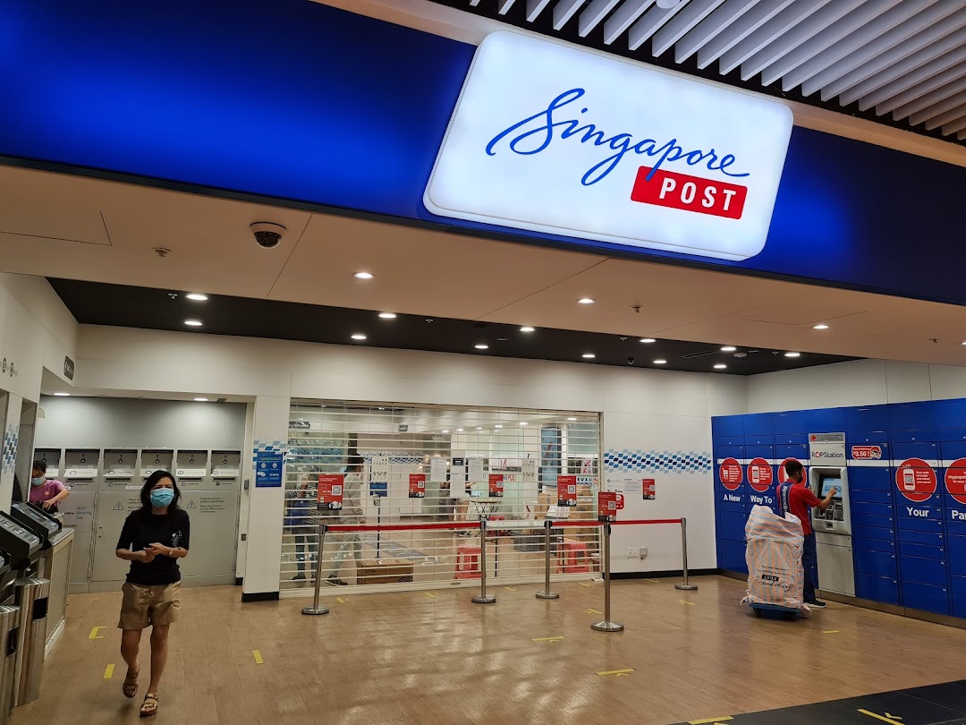Interior view of Singapore Post at Jurong Point, featuring parcel lockers and a customer.
