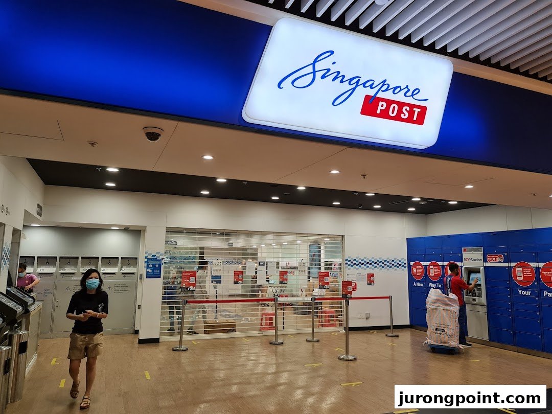 Interior view of Singapore Post at Jurong Point, featuring parcel lockers and a customer.