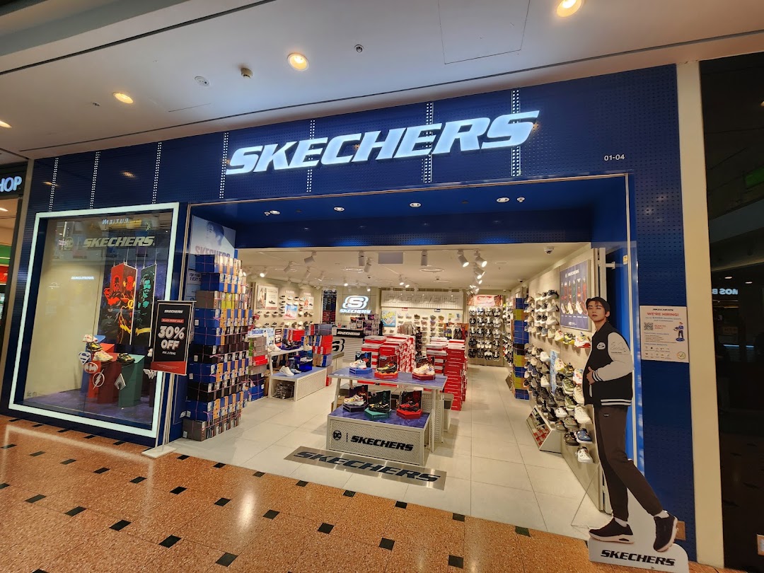 The Skechers storefront features a prominent logo, display windows, and an inviting entrance showcasing various footwear.