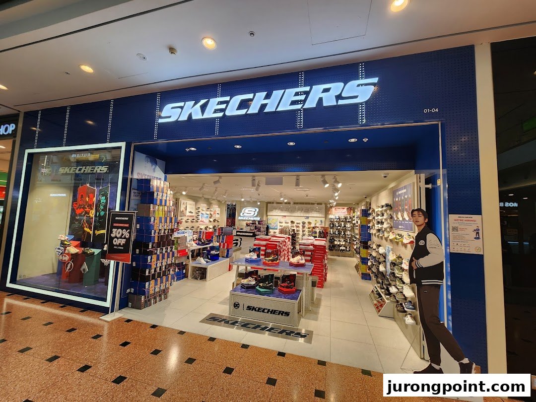 The Skechers storefront features a prominent logo, display windows, and an inviting entrance showcasing various footwear.