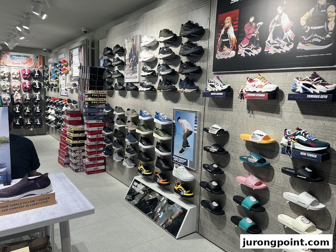 An interior view of a Skechers store showcasing a wide variety of athletic and casual footwear, including sandals and sneakers.