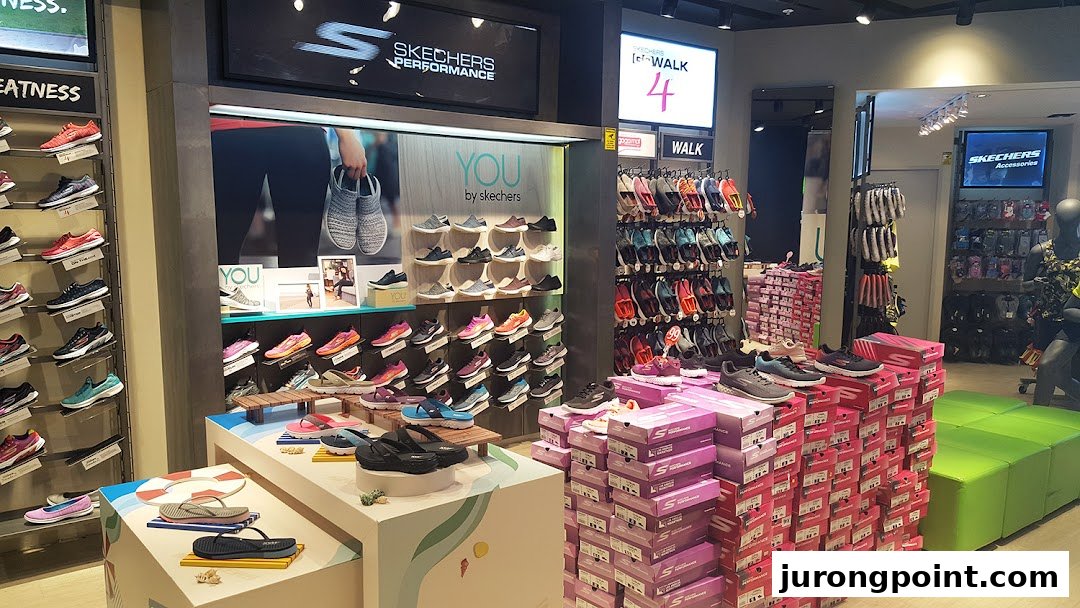 An interior view of a Skechers store showcasing a wide variety of athletic and casual footwear.