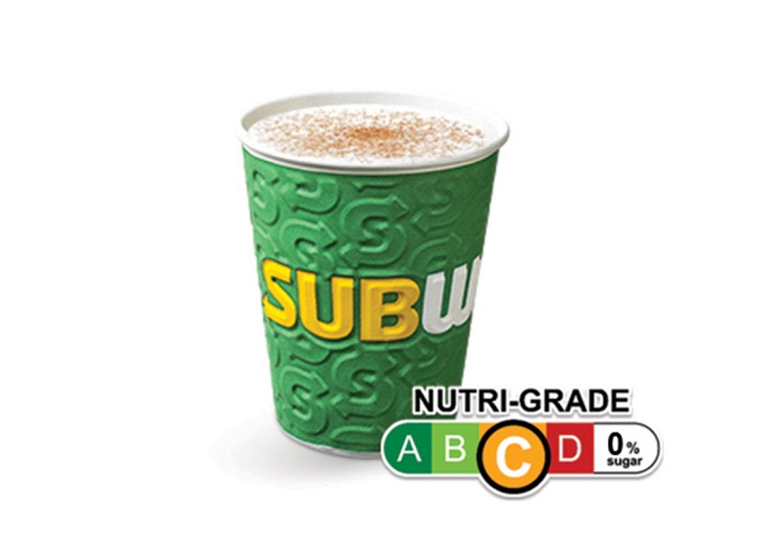 A Subway branded cup containing a drink, featuring a Nutri-Grade C label.