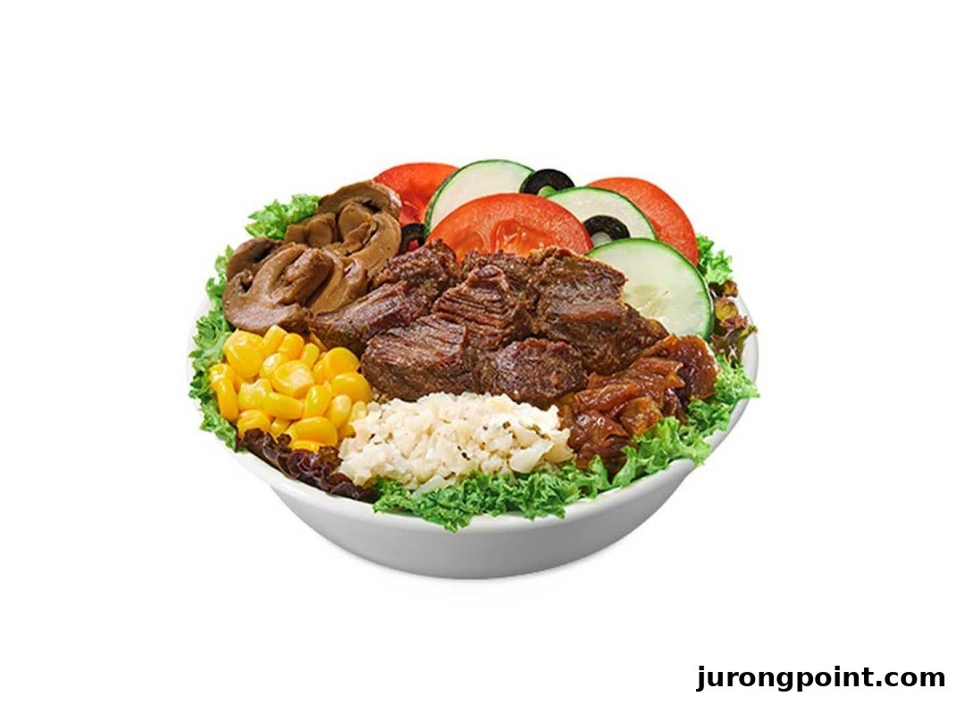 A vibrant salad bowl featuring beef, mushrooms, corn, tomatoes, cucumbers, and lettuce.