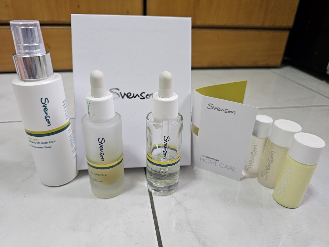 A collection of Svenson hair loss and scalp treatment products, including tonics, serums, and lotions.