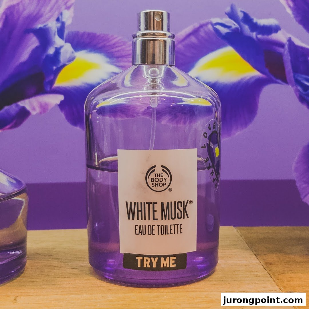 A close-up of The Body Shop's White Musk Eau de Toilette bottle on display.
