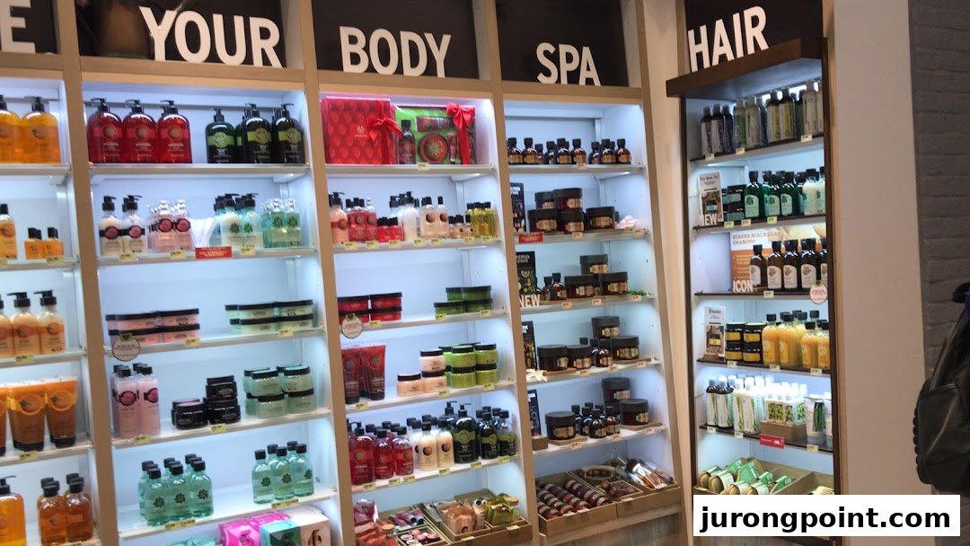 Brightly lit shelves display a wide array of The Body Shop's body, spa, and hair care products.