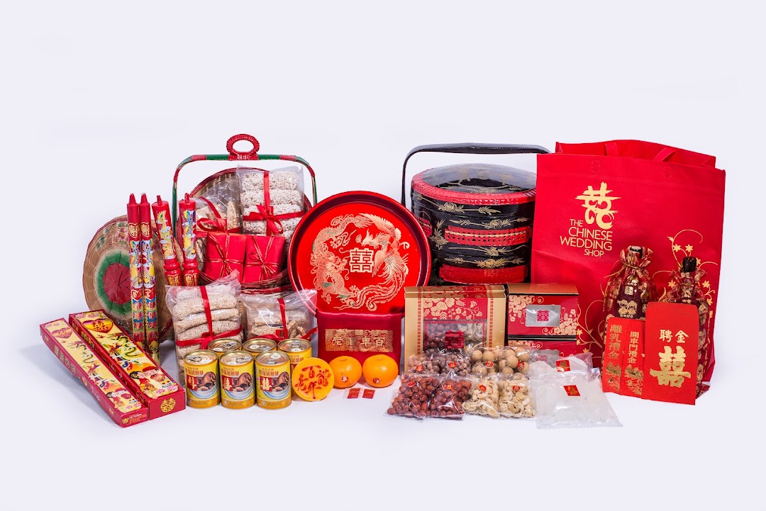 A vibrant display of traditional Chinese wedding essentials, including gifts, baskets, and ceremonial items.