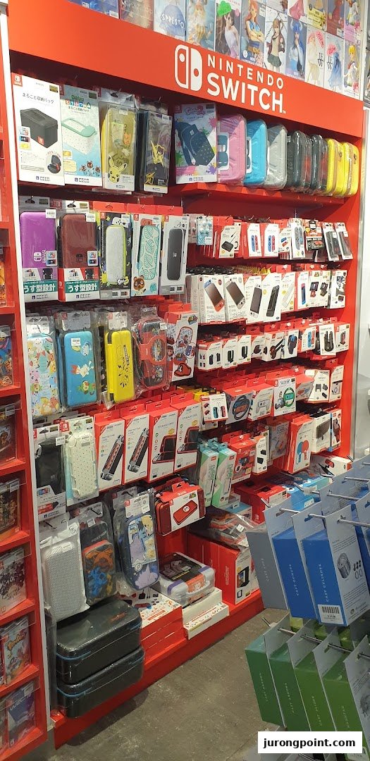 A vibrant display of Nintendo Switch accessories and games inside Toy Or Game TOG.