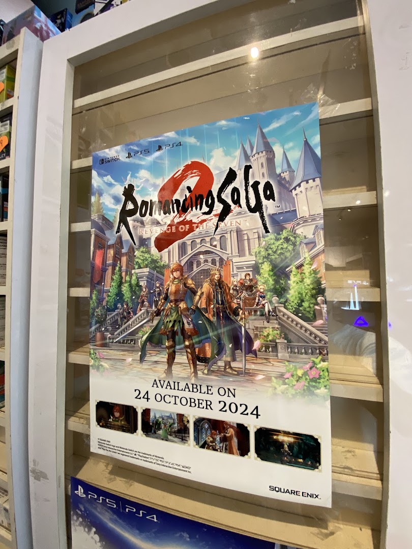 A poster for the video game 'Romancing SaGa 2: Revenge of the Seven' displayed in a shop.