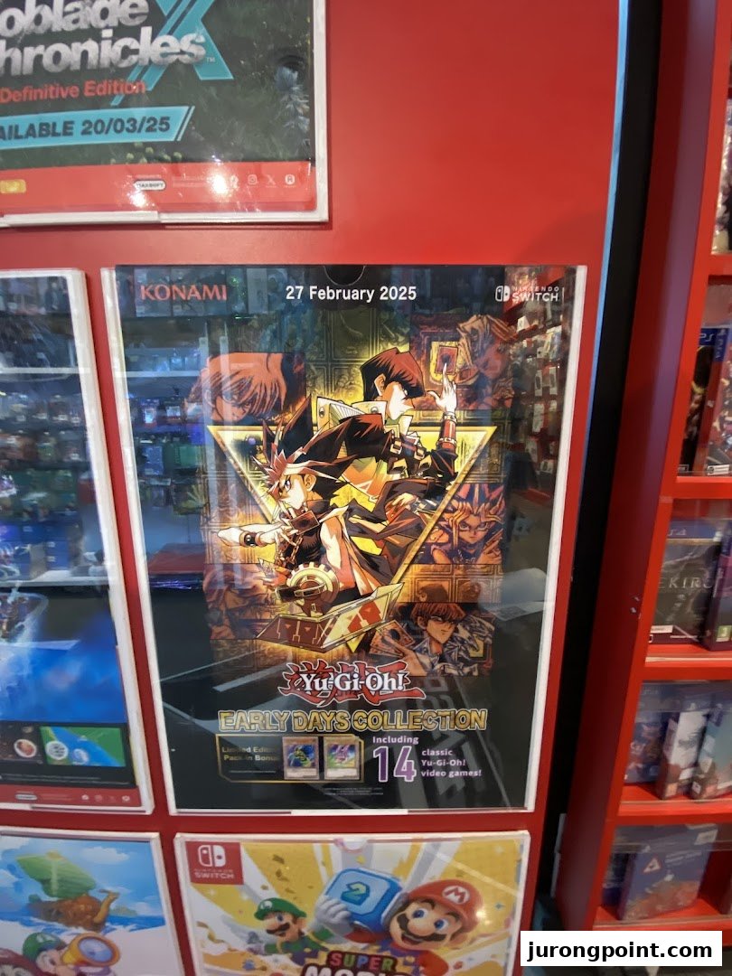 Promotional posters for video games like Yu-Gi-Oh! and Super Mario displayed inside a vibrant toy and game shop.