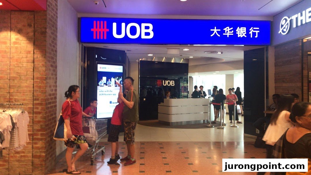The UOB bank branch entrance at Jurong Point, with customers inside and outside.