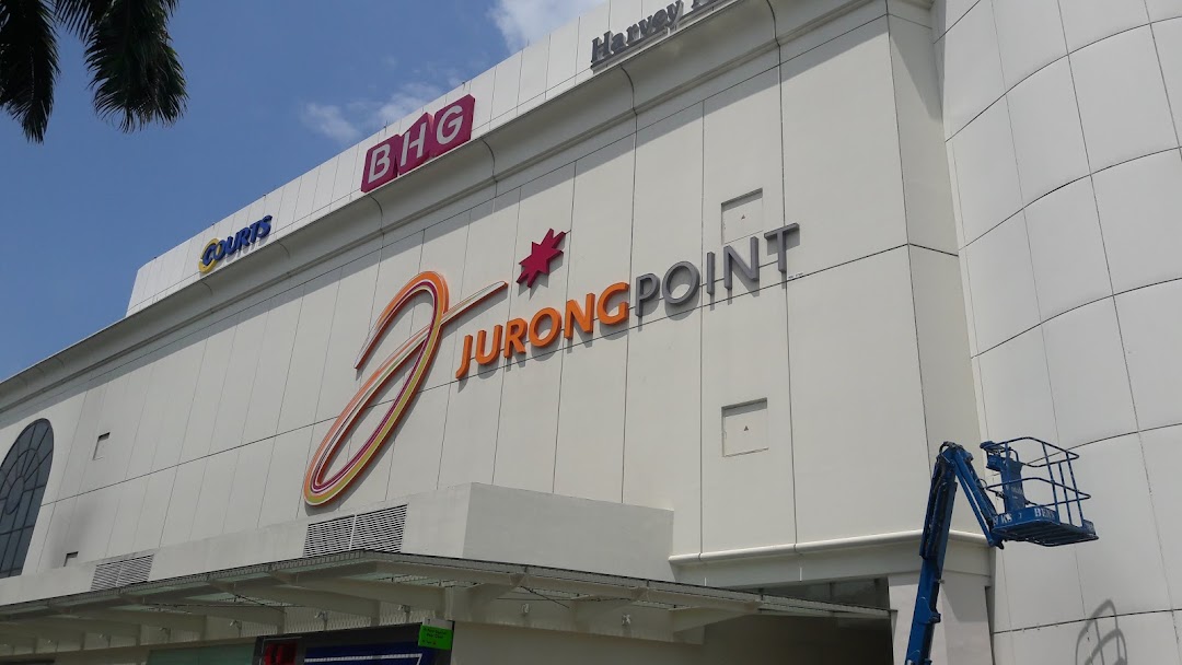 Exterior view of Jurong Point shopping mall facade with its prominent logo and tenant signs.
