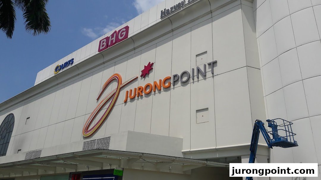 Exterior view of Jurong Point shopping mall facade with its prominent logo and tenant signs.