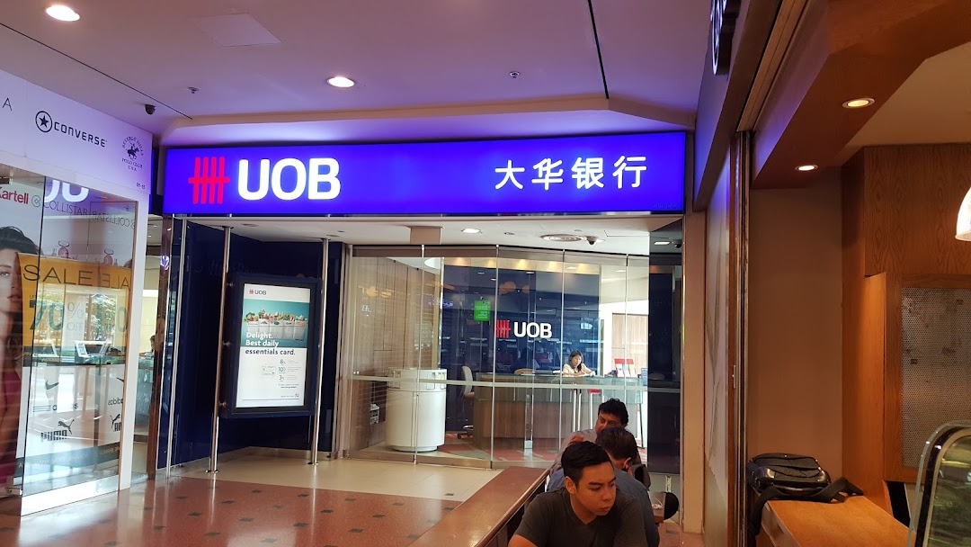 The brightly lit entrance of the UOB bank branch at Jurong Point.