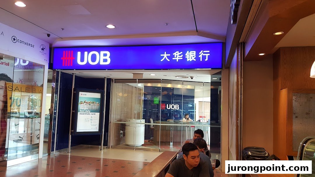 The brightly lit entrance of the UOB bank branch at Jurong Point.