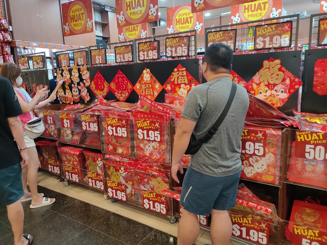 Customers browse vibrant Chinese New Year decorations and festive items at Valu.