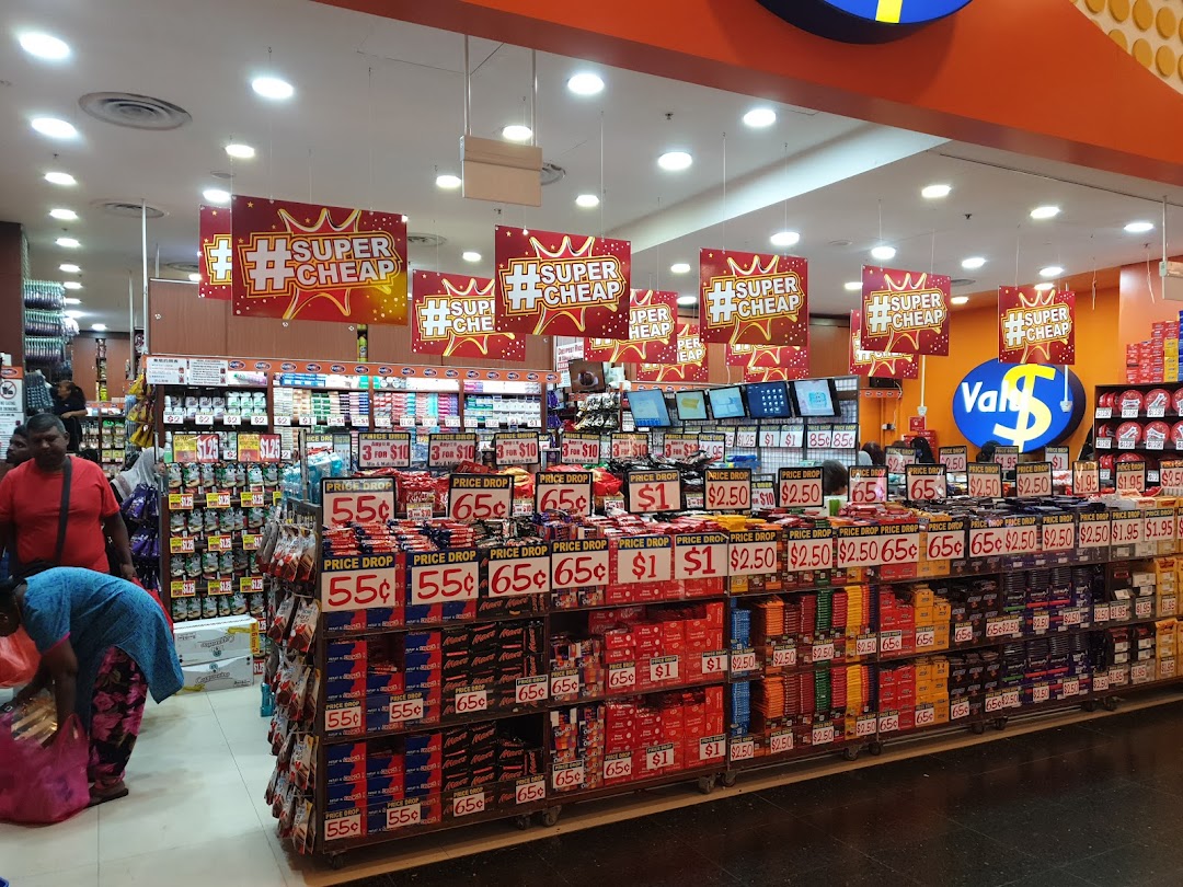 Entrance of Valu discount store featuring numerous products and 'Super Cheap' promotions.
