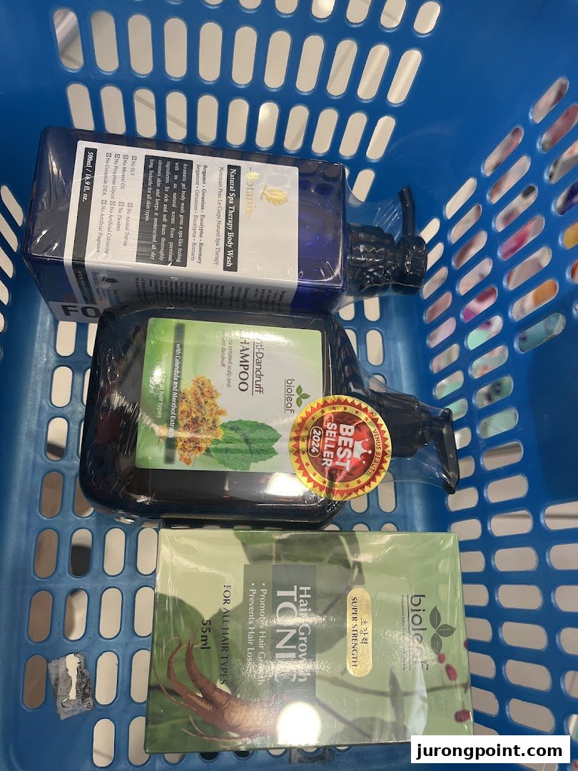 A blue shopping basket filled with beauty and hair care products from Venus Beauty.