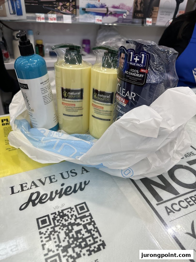 A shopping bag filled with hair care products, including shampoo and conditioner, with a QR code for customer reviews.