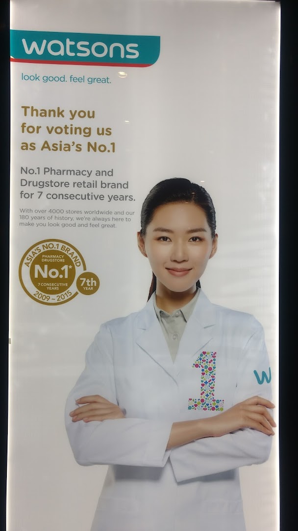 A Watsons promotional poster featuring a woman in a lab coat and highlighting their 'Asia's No.1' status.