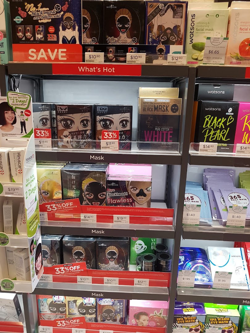 A retail shelf inside Watsons displaying a wide variety of facial masks and skincare products.