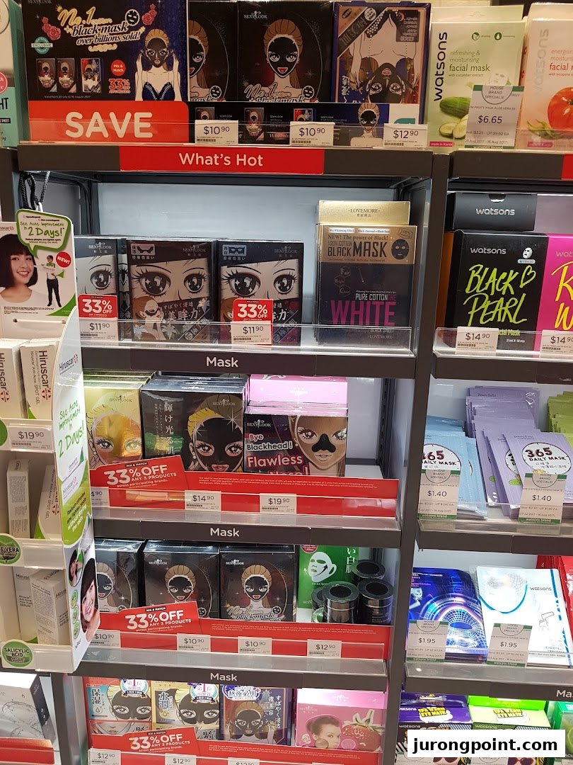 A retail shelf inside Watsons displaying a wide variety of facial masks and skincare products.