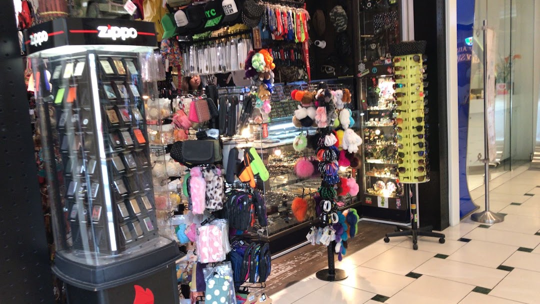 Interior view of X-Craft, showcasing a wide array of accessories, gifts, and Zippo lighters.