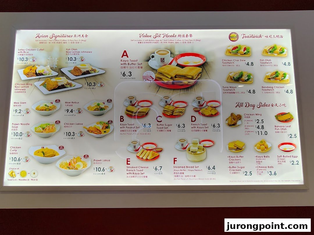 A brightly lit menu board displaying a variety of Asian signatures, value sets, toastwiches, and sides.
