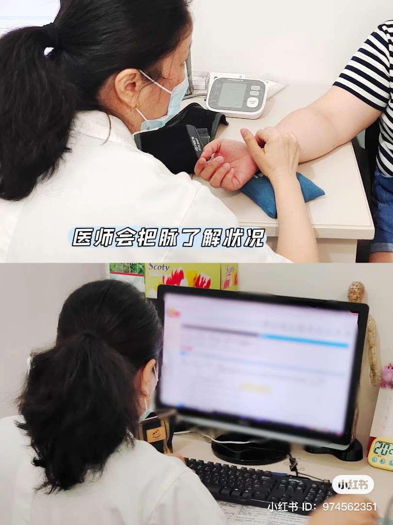 A TCM practitioner conducts a pulse diagnosis and works on patient records.