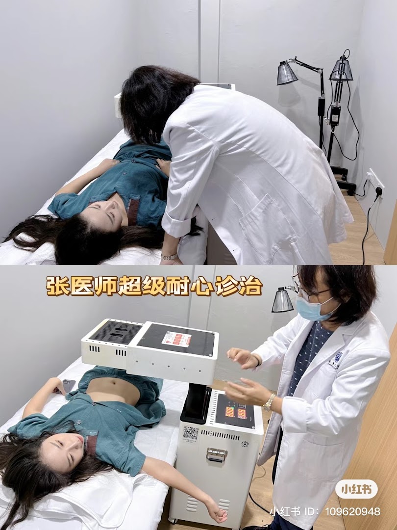 A patient receives traditional Chinese medicine treatment from a practitioner using specialized equipment.
