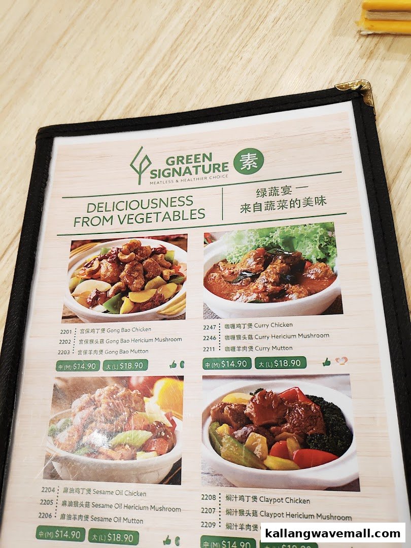 A menu page from Green Signature showcasing various meatless and healthier choice dishes.