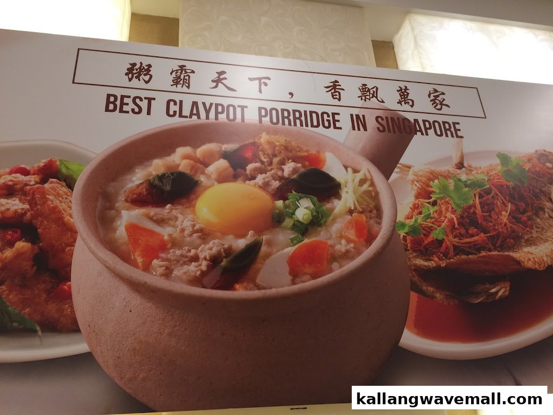 A promotional image featuring a delicious claypot porridge, fried fish, and other dishes, with text proclaiming 'Best Claypot Porridge in Singapore'.