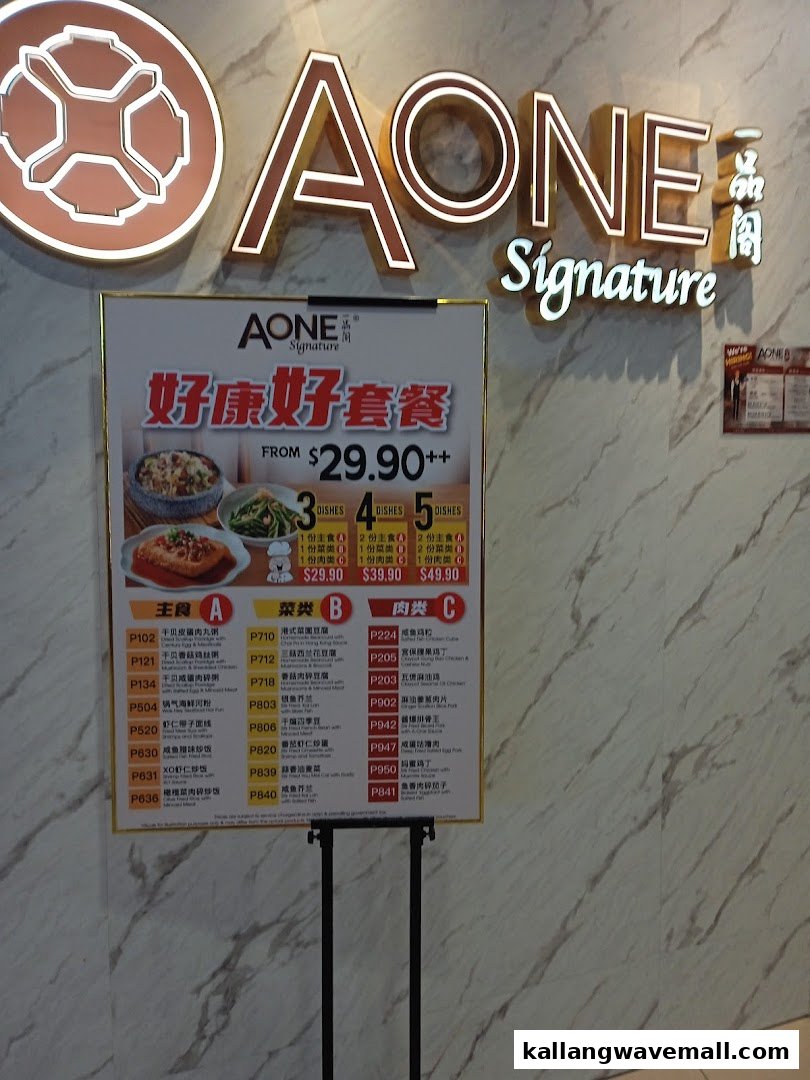 A-One Signature shop front with a promotional standee displaying set meal options and a detailed menu.