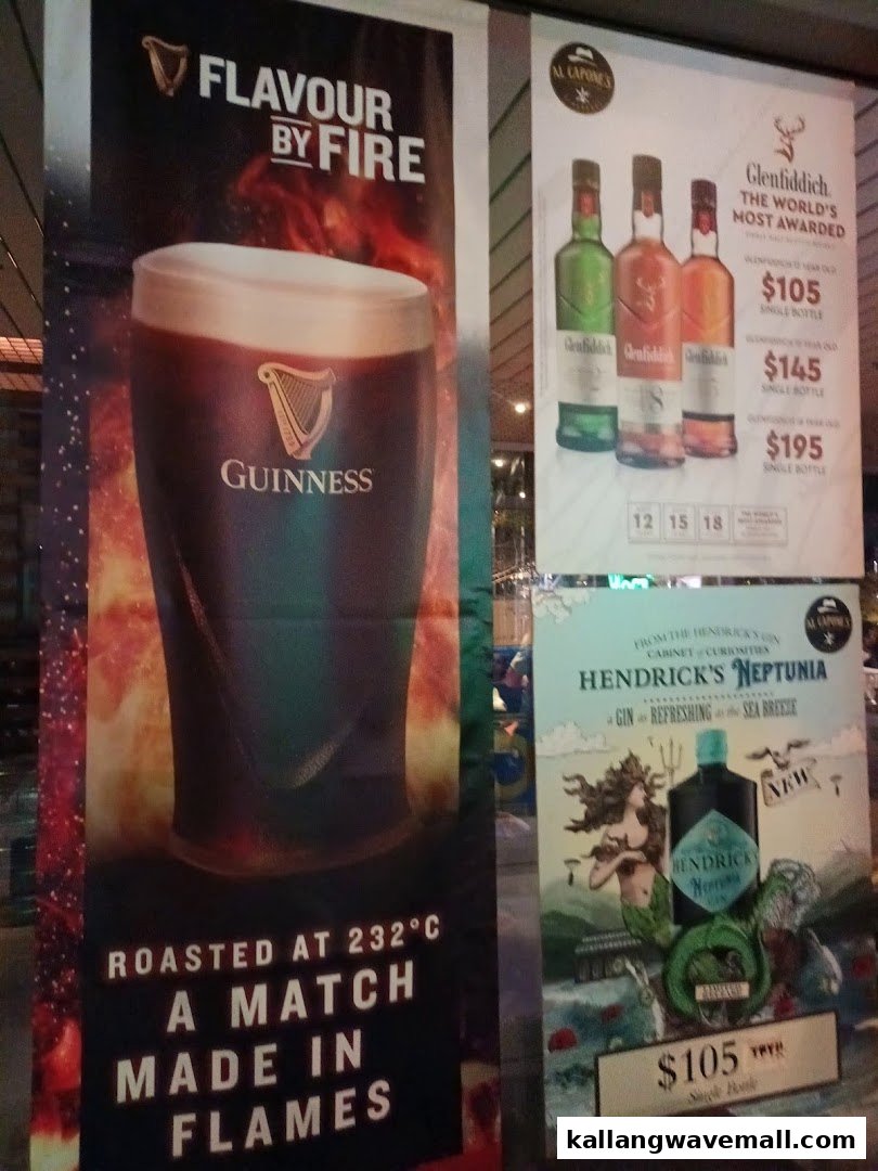 Promotional banners for Guinness, Glenfiddich whisky, and Hendrick's Neptunia gin with prices at Al Capones.