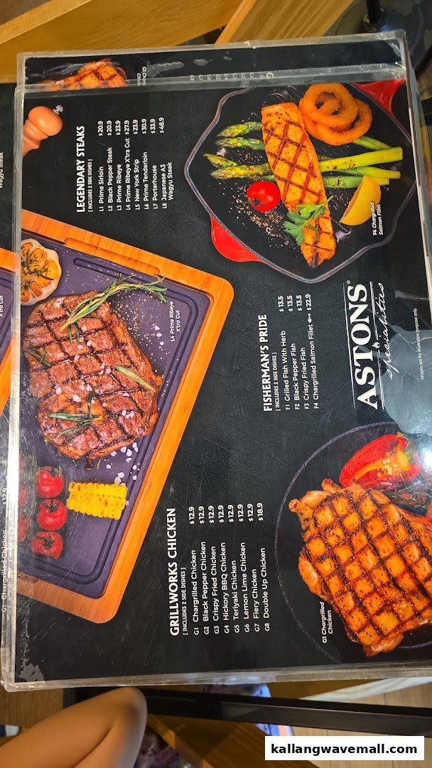 A detailed menu from ASTONS Specialities showcasing steaks, chicken, and fish dishes.