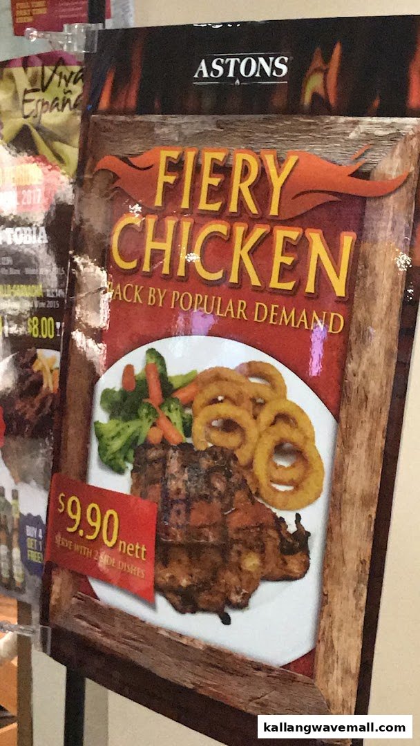 A promotional poster for ASTONS' 'Fiery Chicken' dish, showing the meal and its price.