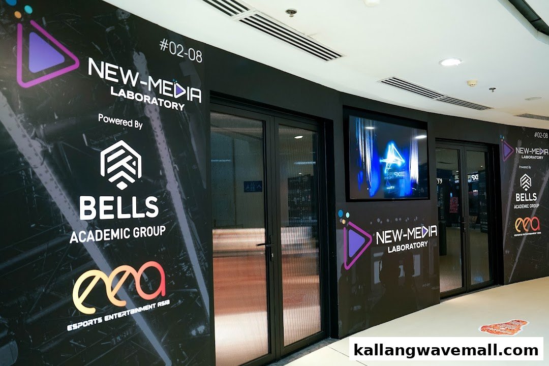 The entrance of BELLS New-Media Laboratory, featuring prominent branding and a digital display.