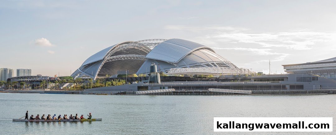 Panoramic view of Singapore Sports Hub and Kallang Basin with a rowing team.