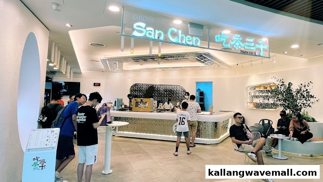 Interior view of CHICHA San Chen, showing customers at the counter and seating area.
