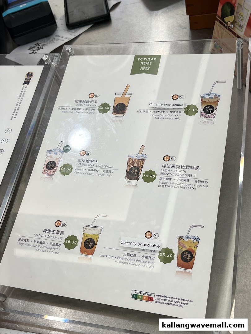 A close-up of CHICHA San Chen's menu displaying popular bubble tea and fruit drink options.