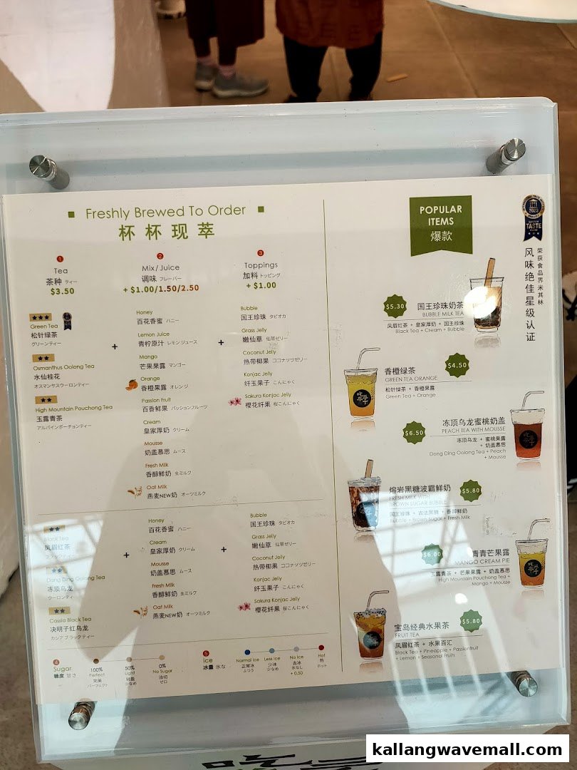 A detailed menu board for CHICHA San Chen, showcasing various freshly brewed teas, mixes, toppings, and popular drinks.