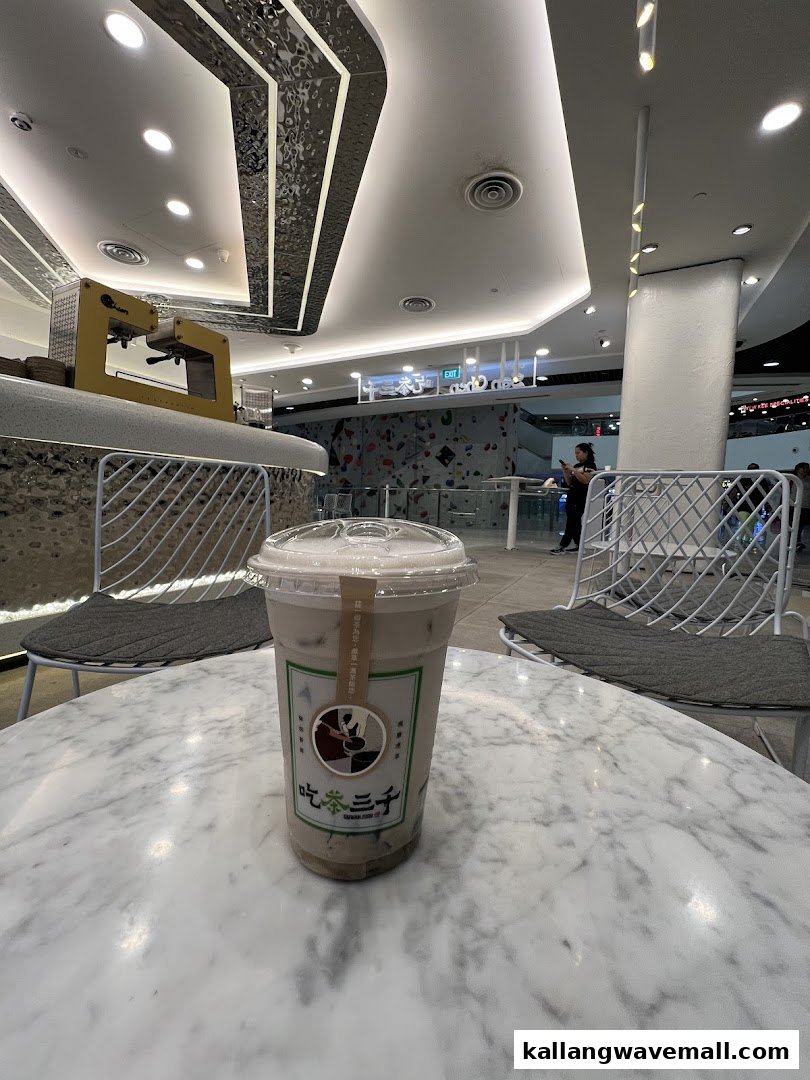 A refreshing bubble tea from CHICHA San Chen on a marble table in a modern setting.