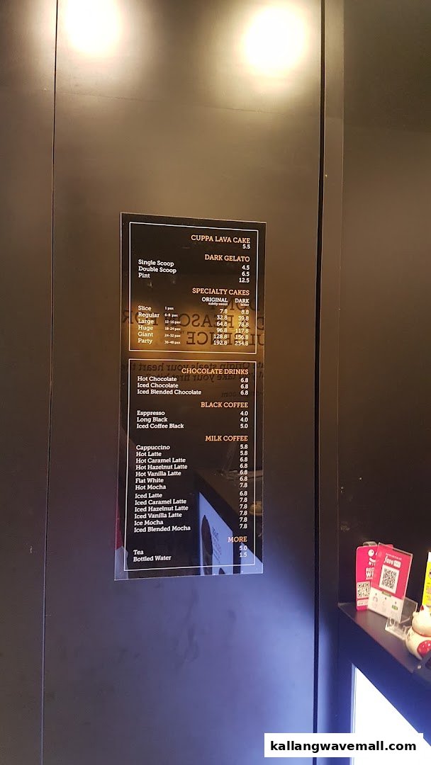 A digital menu board displaying cakes, gelato, chocolate drinks, coffee, and other beverages.
